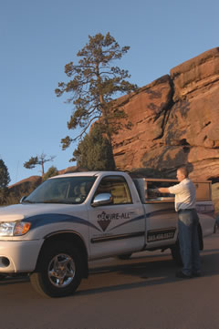 ken standing by truck